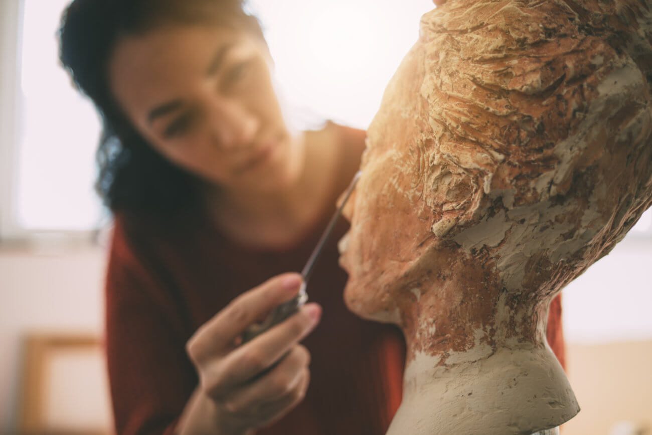 artist is working in an atelier art and sculpture